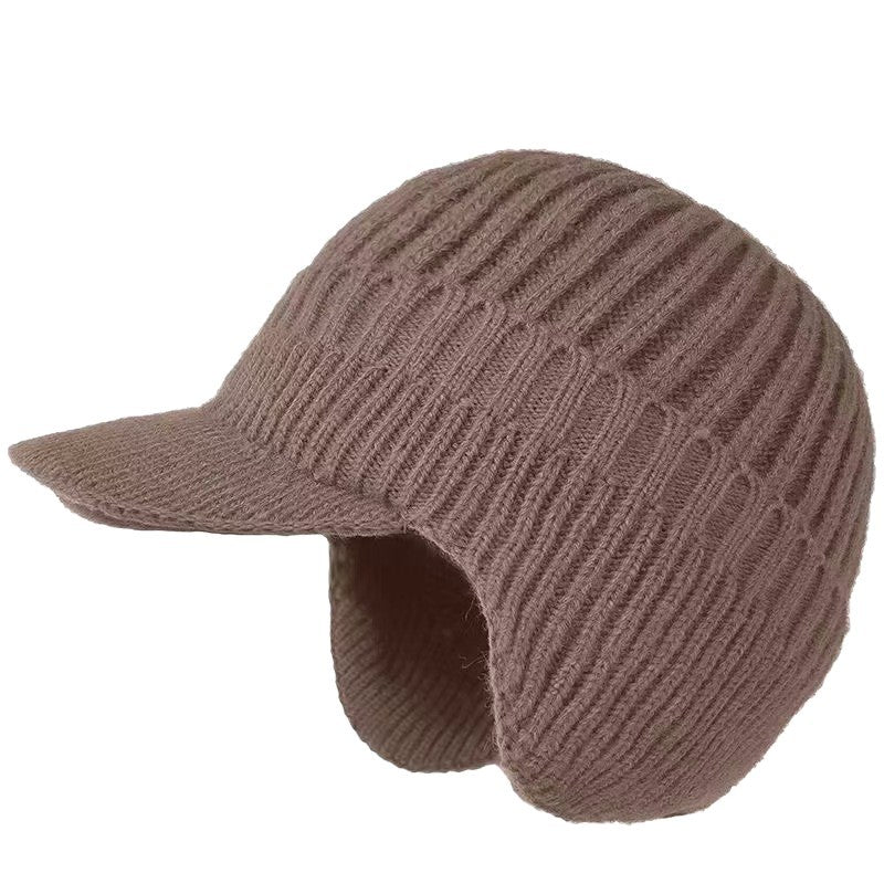 Brown Snuggler Winter Hat by Lurolondon featuring cozy knit material and a warm, snug fit for cold weather.