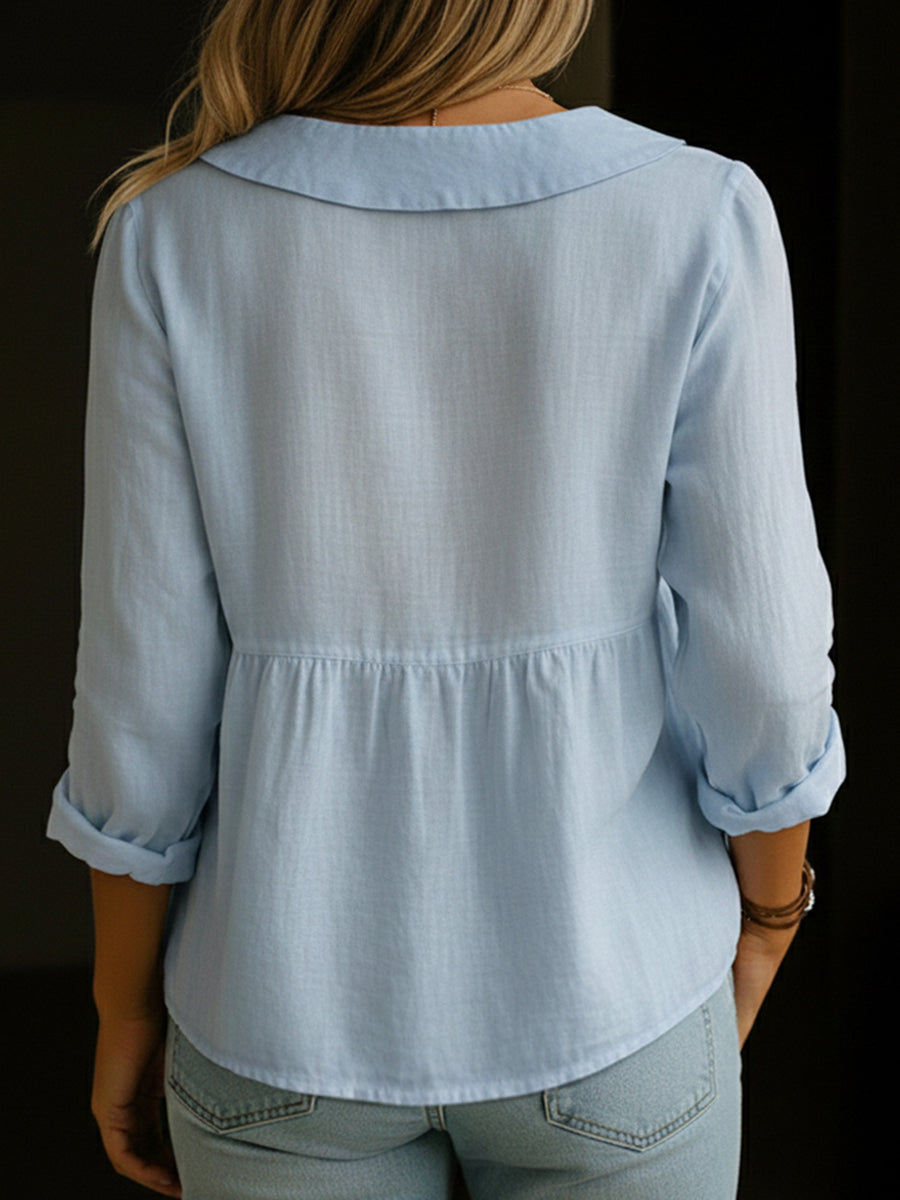 Veda Bremen Arlira linen blouse with Peter-Pan collar, soft textured fabric, long sleeves, and relaxed fit.