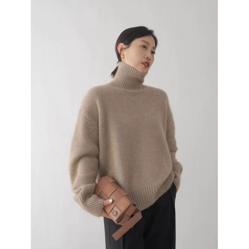 Camel high neck sweater by Lurolondon.co.uk, featuring a cozy, fitted design and soft knit fabric in a warm camel color.