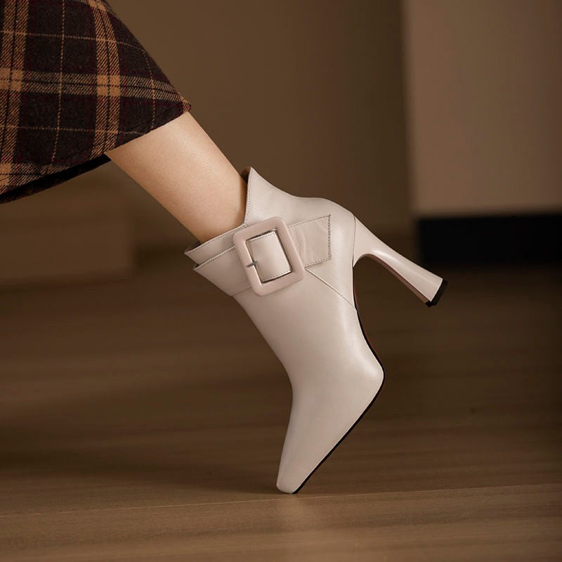 Creamy white buckle ankle boot from Lurolondon.co.uk with a sleek design and stylish buckle detail.