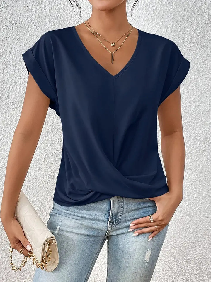 Dark blue Damen V-Neck T-Shirt from Veda Bremen displayed on a hanger, showcasing a simple, stylish women&