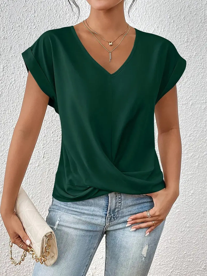 Dark green Damen V-Neck T-Shirt by Veda Bremen, close-up showing soft fabric and V-neckline.