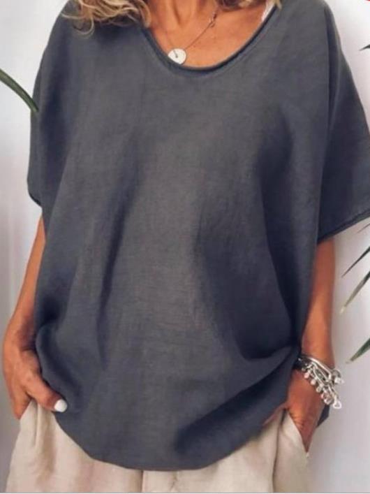 Dark grey Vivian versatile linen blouse by Veda Bremen, featuring a relaxed fit and stylish design for casual or professional wear.