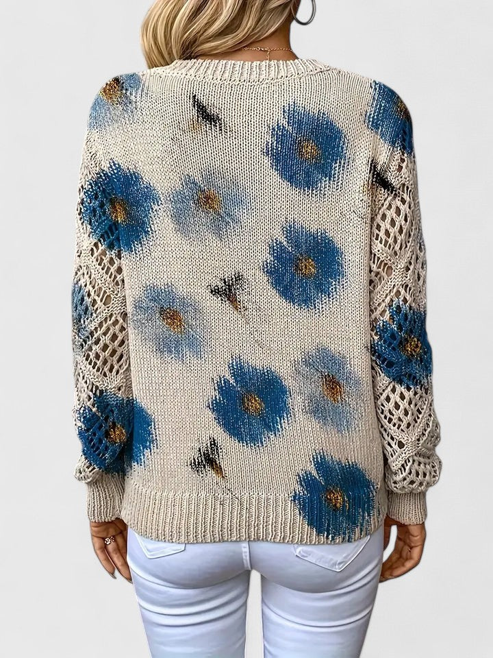 LuroLondon Aurélie Floral Sweater with colorful floral pattern, long sleeves, and cozy knit fabric.