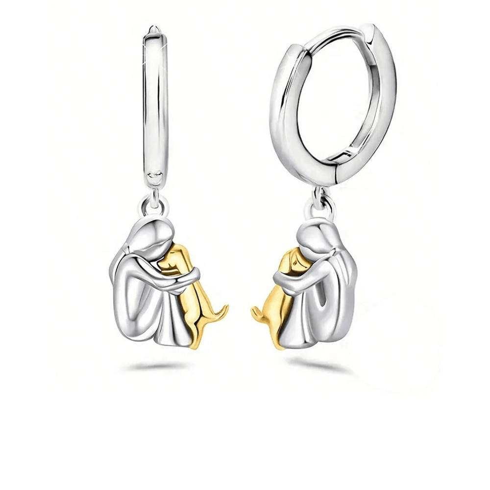 Veda Bremen dog pendant necklace with matching earrings, featuring a faithfulness-themed design on a silver chain.