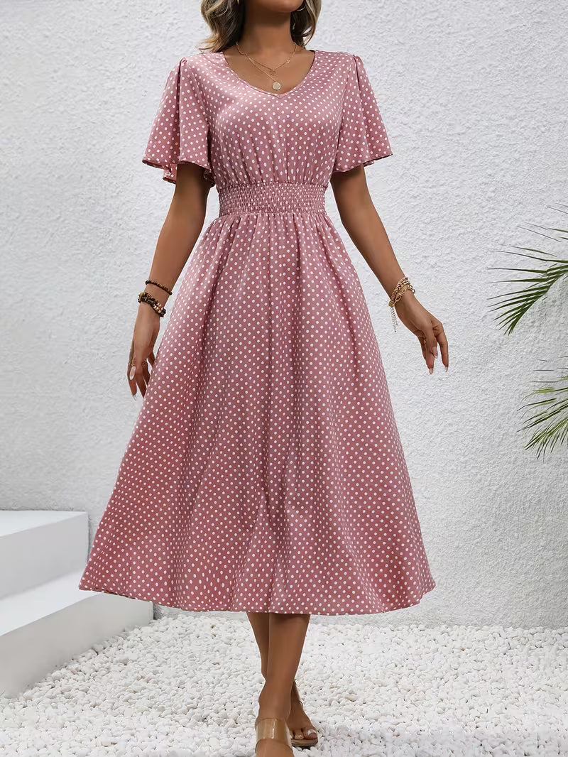 Veda Bremen polka dot dress showing a front view of the stylish, lightweight dress with a fitted waist and short sleeves.