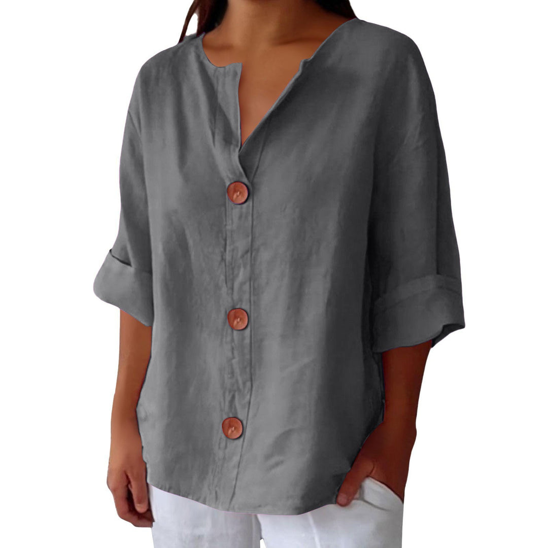 Grey Leah minimalist blouse by Veda Bremen, showing a sleek, tailored design with soft fabric and clean lines.