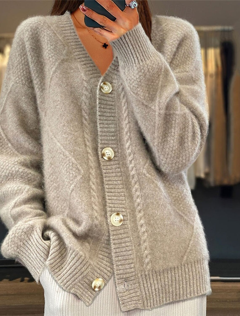 Grey May Knit Cardigan by Ava Mae, featuring a cozy knit texture and a relaxed fit, displayed on a plain background.