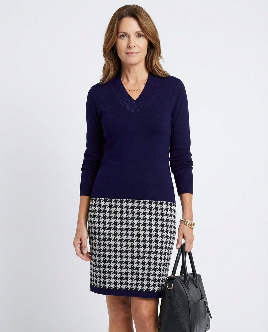 LuroLondon checked dress with a fitted bodice and flared skirt, featuring a classic plaid pattern and long sleeves.
