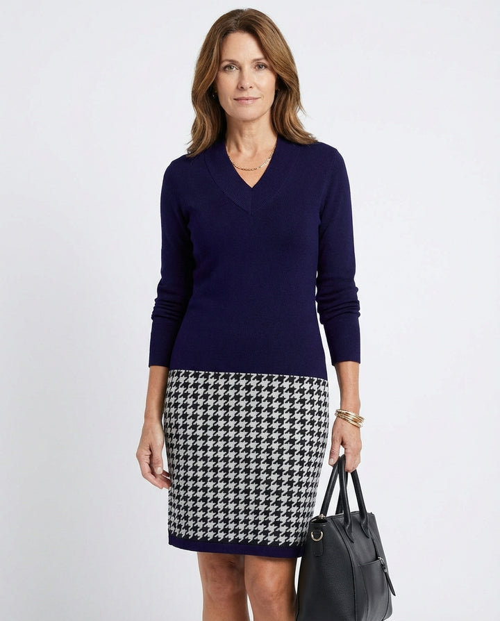 LuroLondon checked dress with a fitted bodice and flared skirt, featuring a classic plaid pattern and long sleeves.