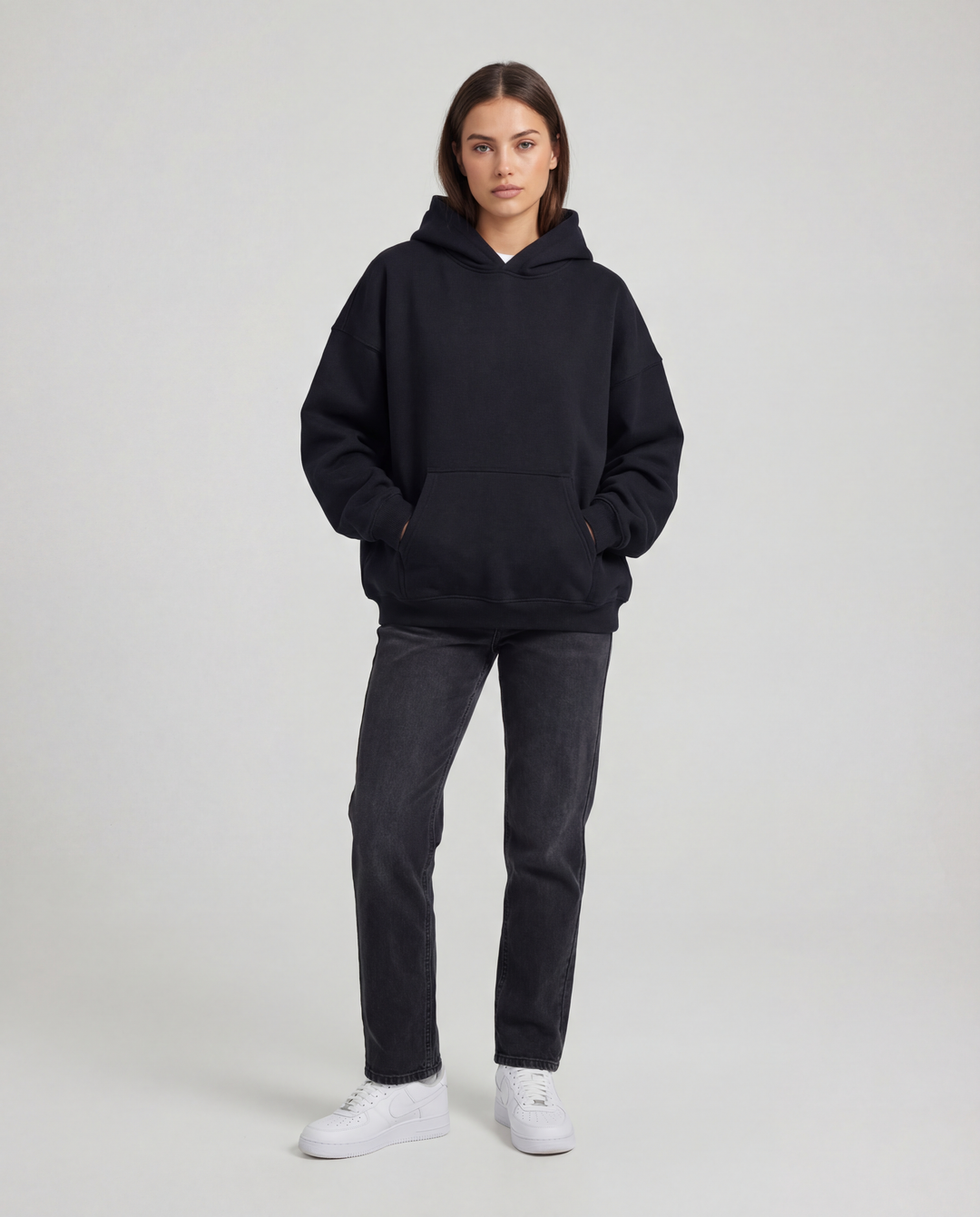 LuroLondon solid pullover hoodie in a cozy, casual style, shown in a neutral color with a front pocket and hood.