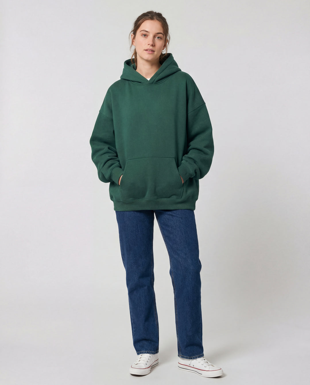 LuroLondon solid pullover hoodie in a soft, neutral color with a relaxed fit and ribbed cuffs, displayed on a hanger.