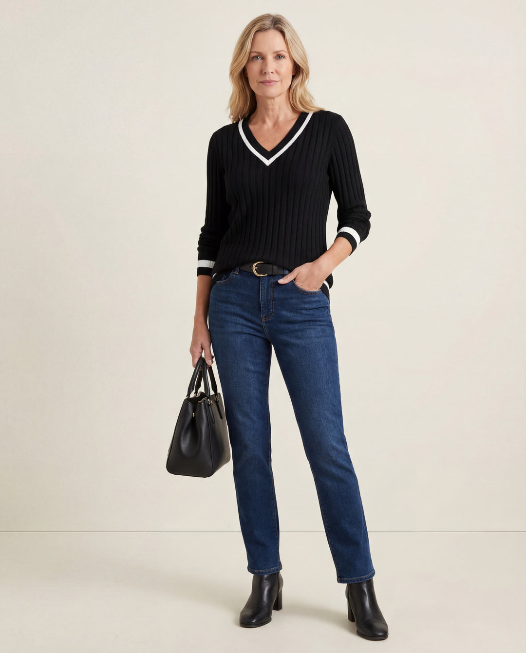 LuroLondon v-neck ribbed sweater in neutral color, close-up of soft knit fabric and fitted style.