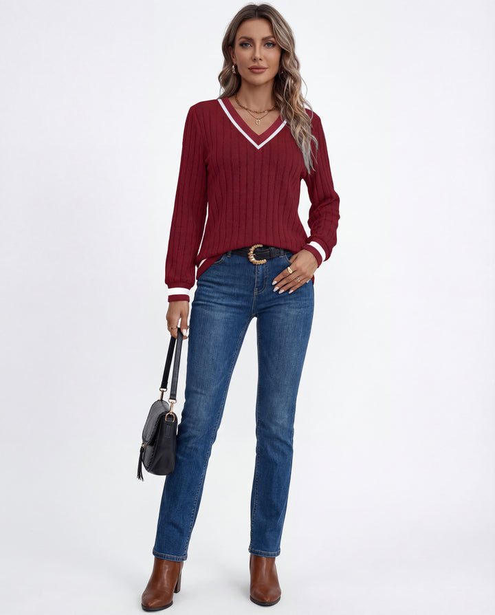 LuroLondon V-Neck ribbed sweater in neutral color, featuring a fitted V-neck design and textured ribbed knit fabric.