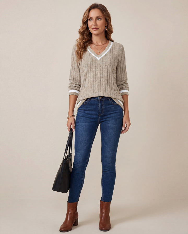 LuroLondon V-Neck ribbed sweater in a soft knit fabric, shown in a close-up highlighting the V-neck and ribbed texture.
