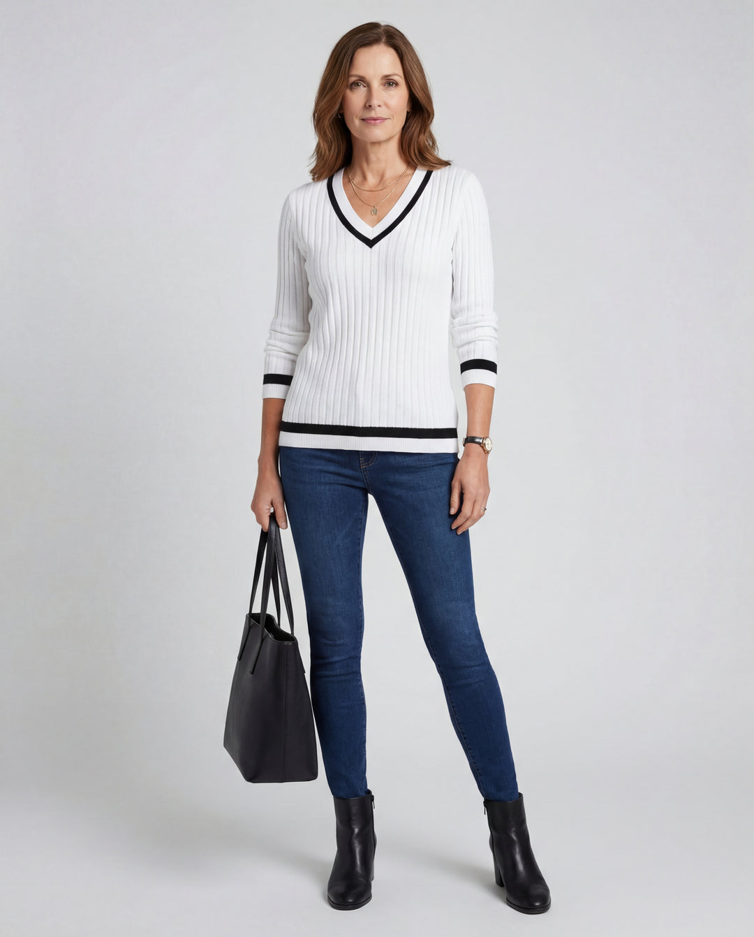 LuroLondon V-Neck ribbed sweater in neutral color, showcasing its fitted V-neck design and textured ribbed knit fabric.