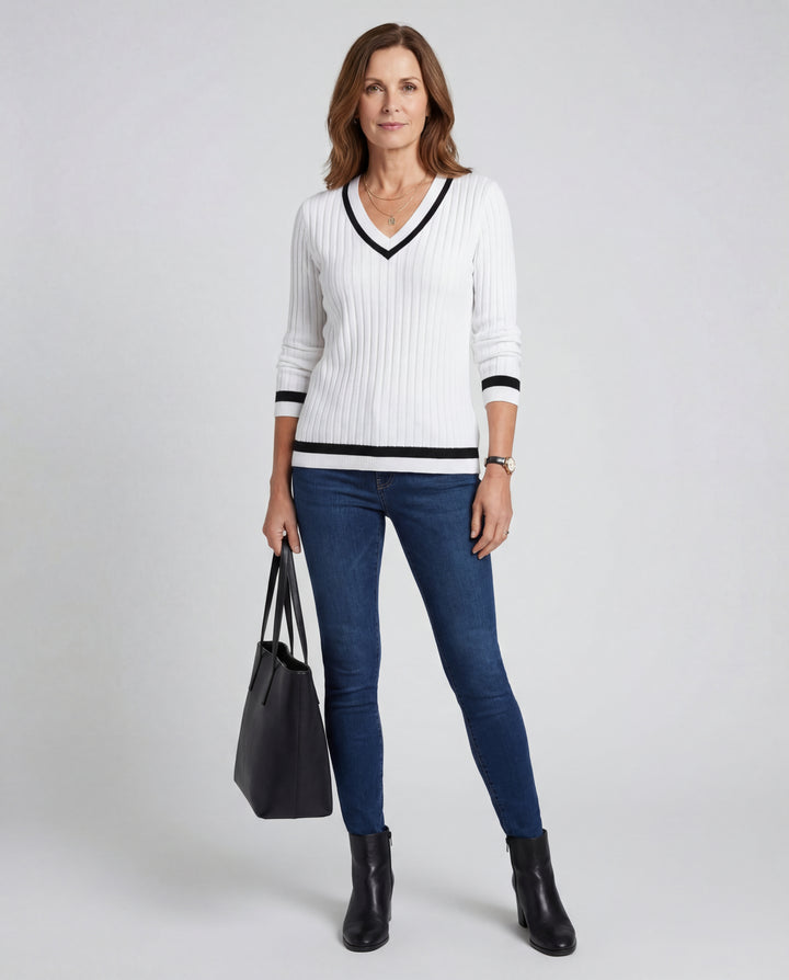 LuroLondon V-Neck ribbed sweater in neutral color, showcasing its fitted V-neck design and textured ribbed knit fabric.