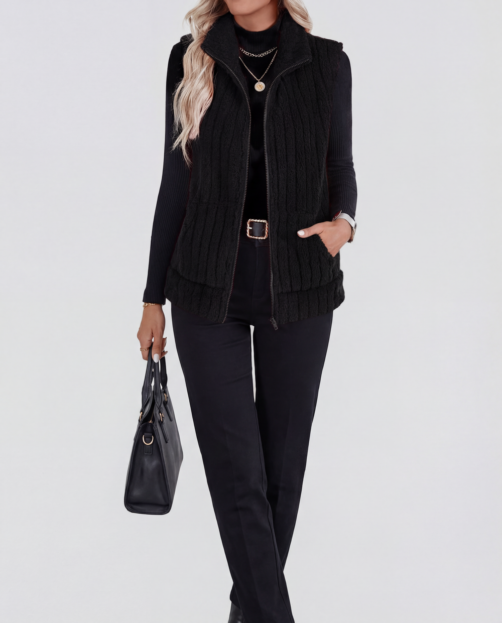 LuroLondon The Plush Zip-Up in soft fabric with a front zipper and hood, displayed on a hanger against a plain background.