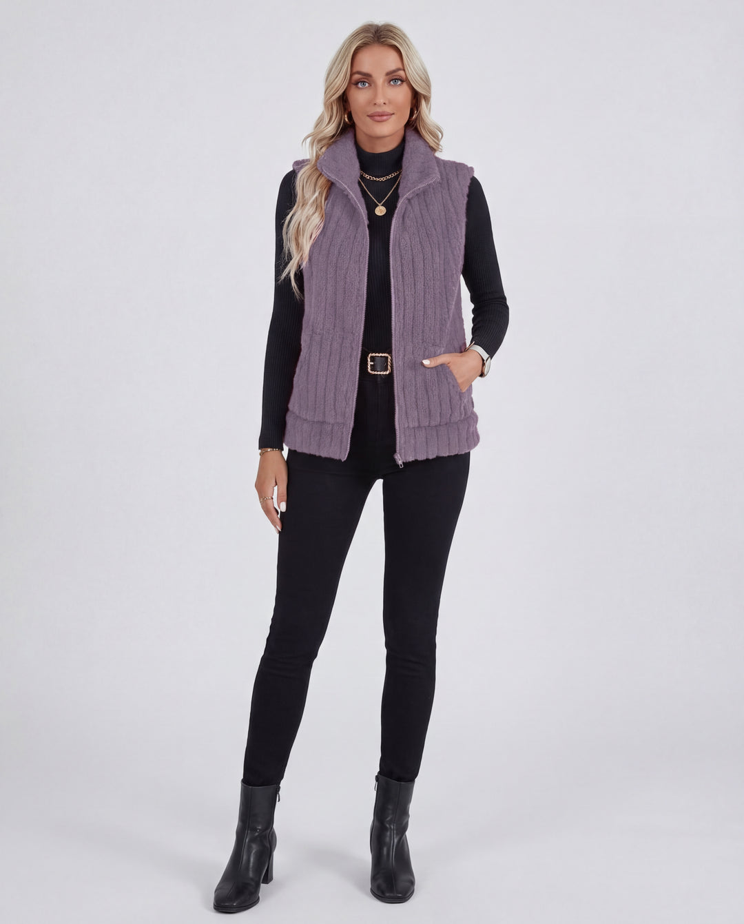 LuroLondon The Plush Zip-Up in soft, cozy fabric with a front zipper and hood, displayed on a hanger.