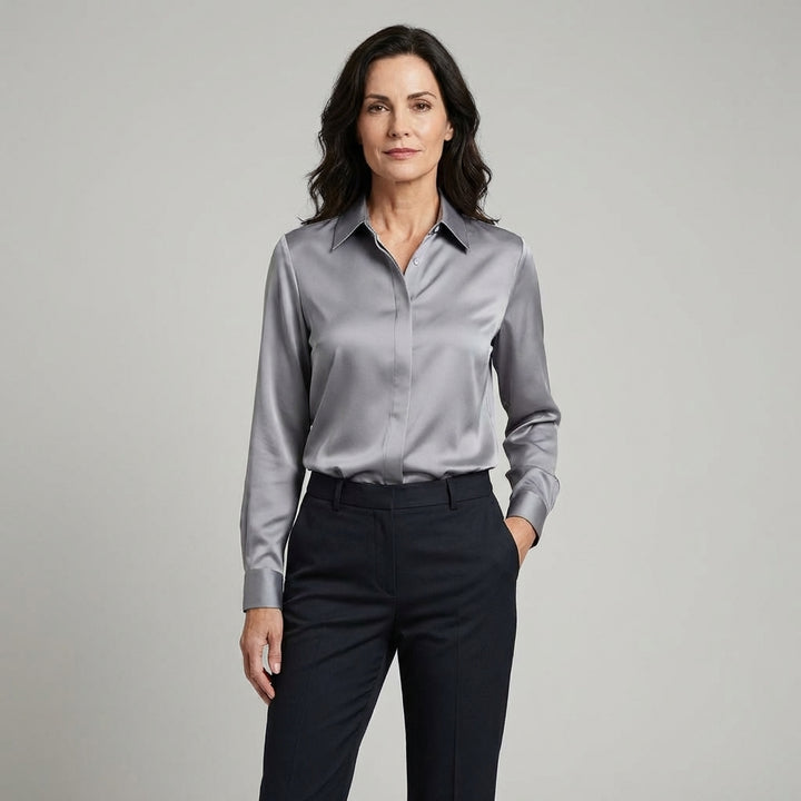 Veda Bremen Melly elegant shirt in soft fabric, featuring a classic collar and button-down design, displayed on a hanger.