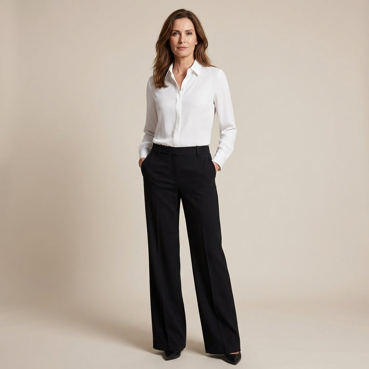 Veda Bremen Melly elegant button-up shirt in crisp fabric, displayed on a hanger with a neutral background