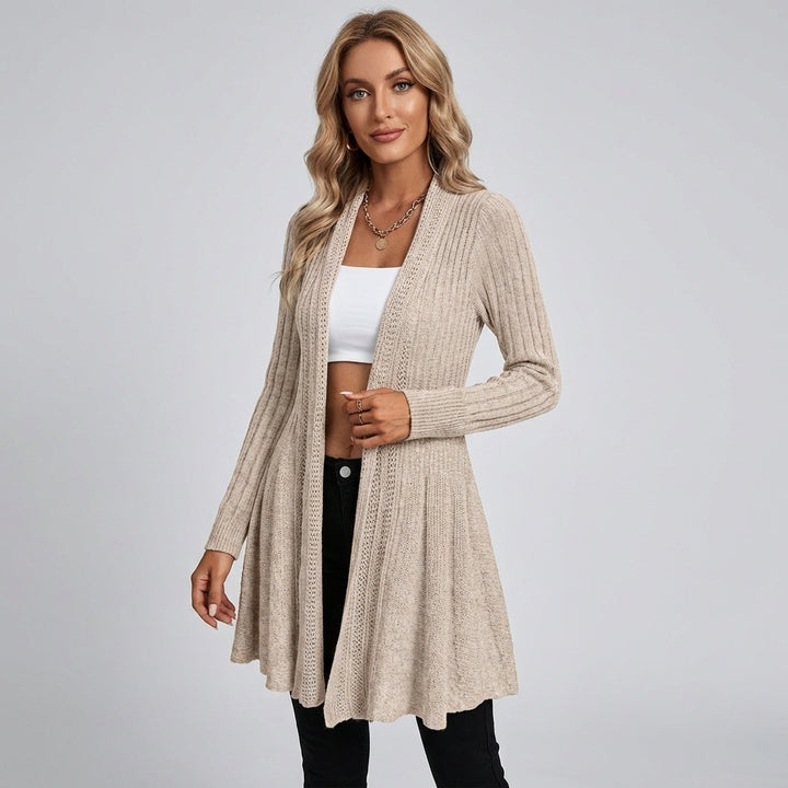 Veda Bremen knitted cardigan with textured pattern, long sleeves, and open front for a cozy, stylish layered look.