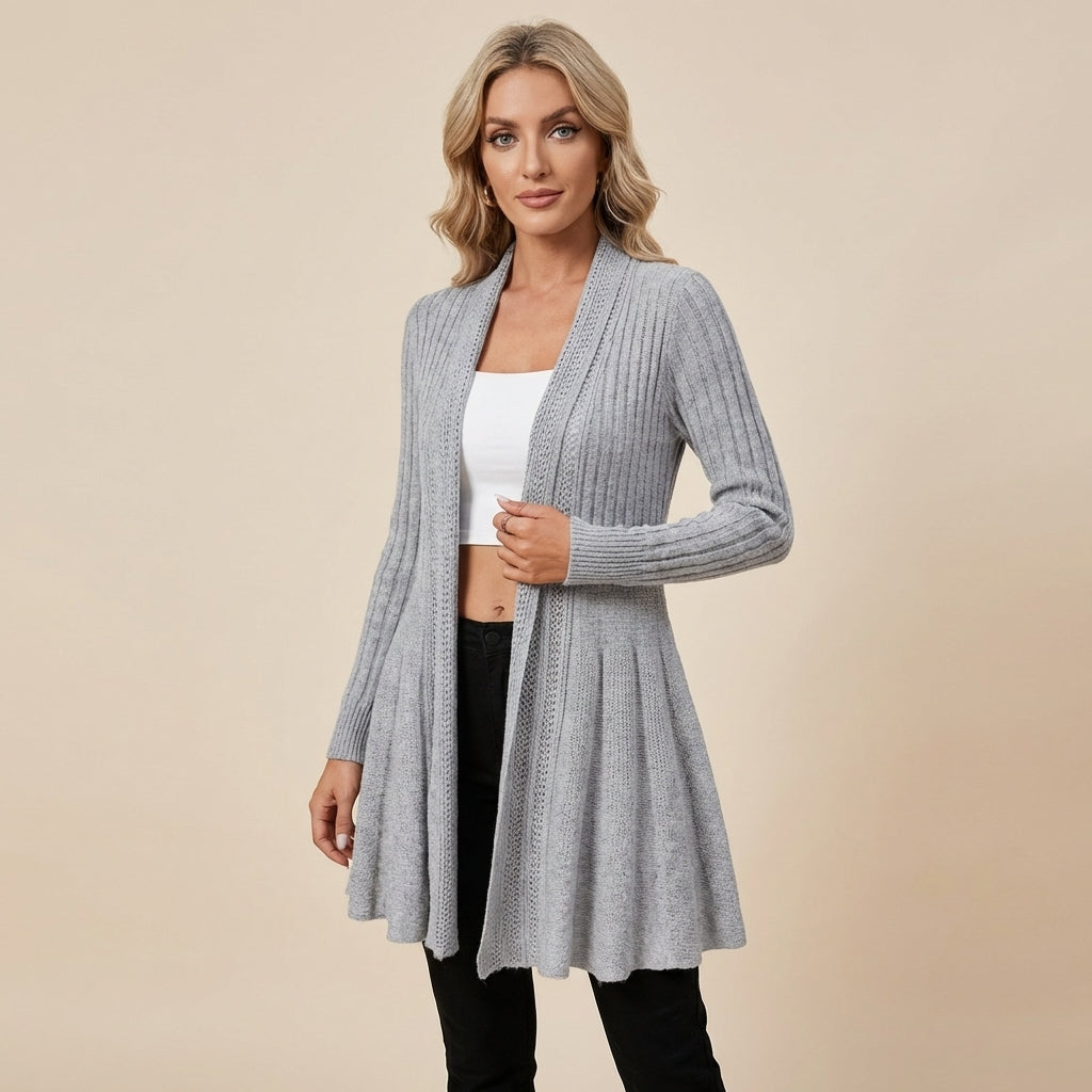 Veda Bremen knitted cardigan with textured structure, featuring a cozy, chunky design in soft yarn, perfect for casual wear.