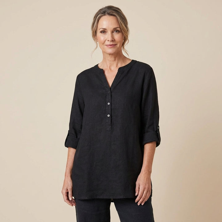 Veda Bremen Reja button-up shirt in light fabric, featuring a classic collar and long sleeves, displayed on a hanger.