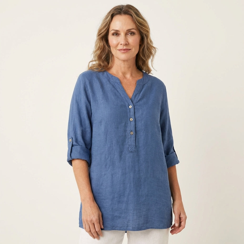 Veda Bremen Reja button-up shirt in lightweight fabric, featuring a classic collar and long sleeves, displayed on a hanger.
