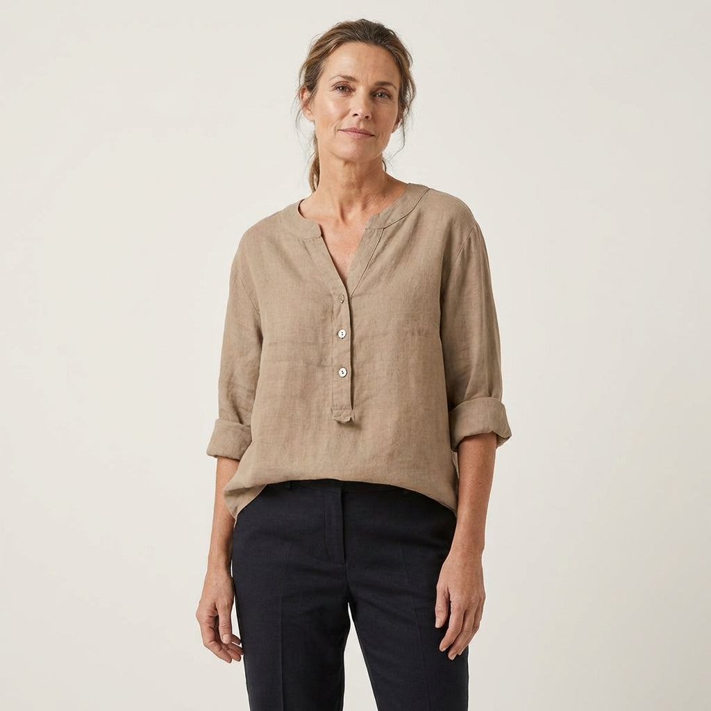 Veda Bremen Reja button-up shirt in light fabric, featuring a classic collar and long sleeves, displayed on a hanger.