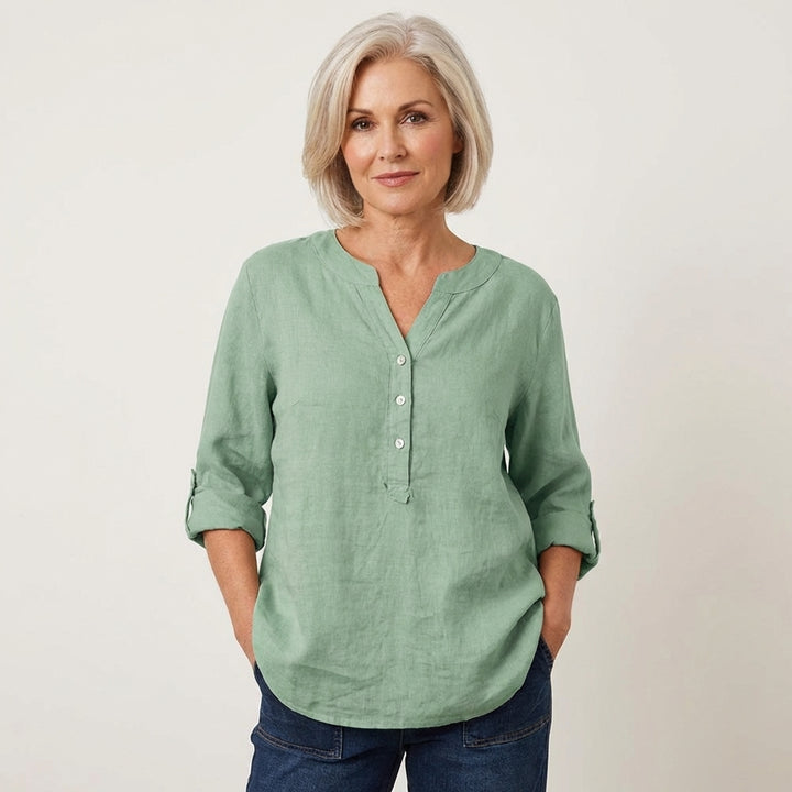 Veda Bremen Reja button-up shirt in lightweight fabric, featuring a classic collar and long sleeves, displayed on a hanger.