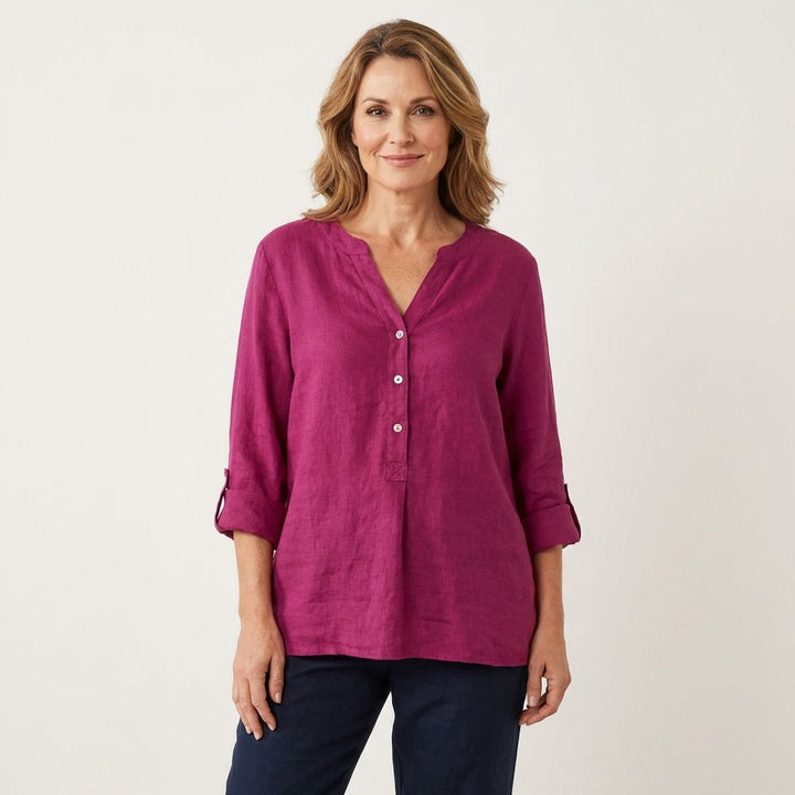 Veda Bremen Reja button-up shirt in light fabric with collar and long sleeves, shown on a hanger.
