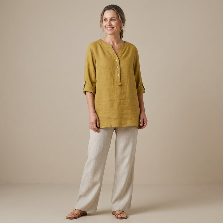 Veda Bremen Reja button-up shirt in lightweight fabric, featuring a classic collar and button front, displayed on a hanger.