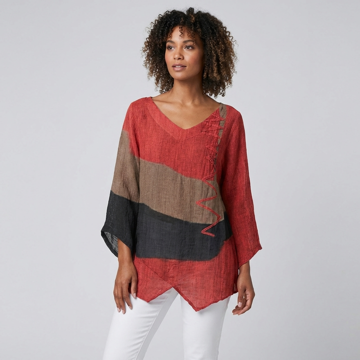 Light blue Veda Bremen summer blouse with elegant, flowing fabric and subtle detailing, perfect for warm weather.
