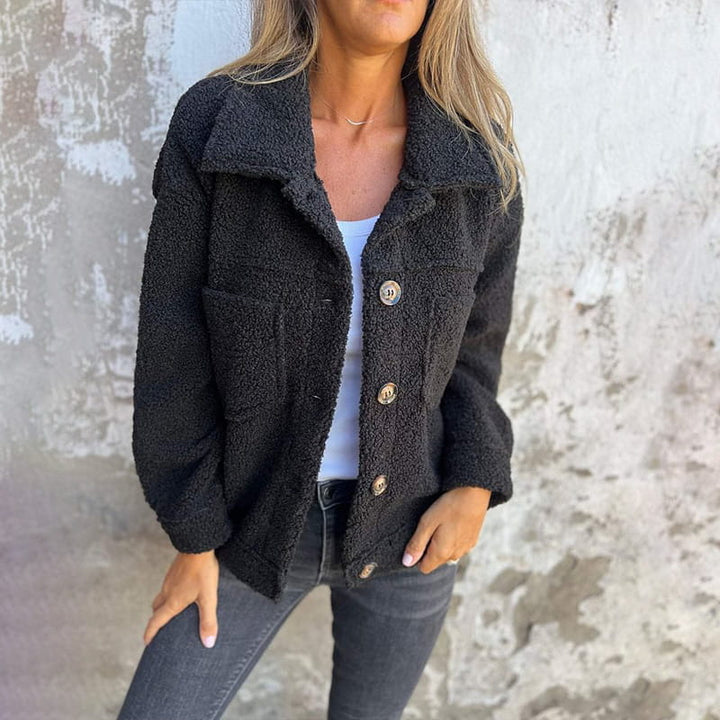 LuroLondon Mia Stylish Coat jacket with tailored fit and button details, displayed on a hanger.