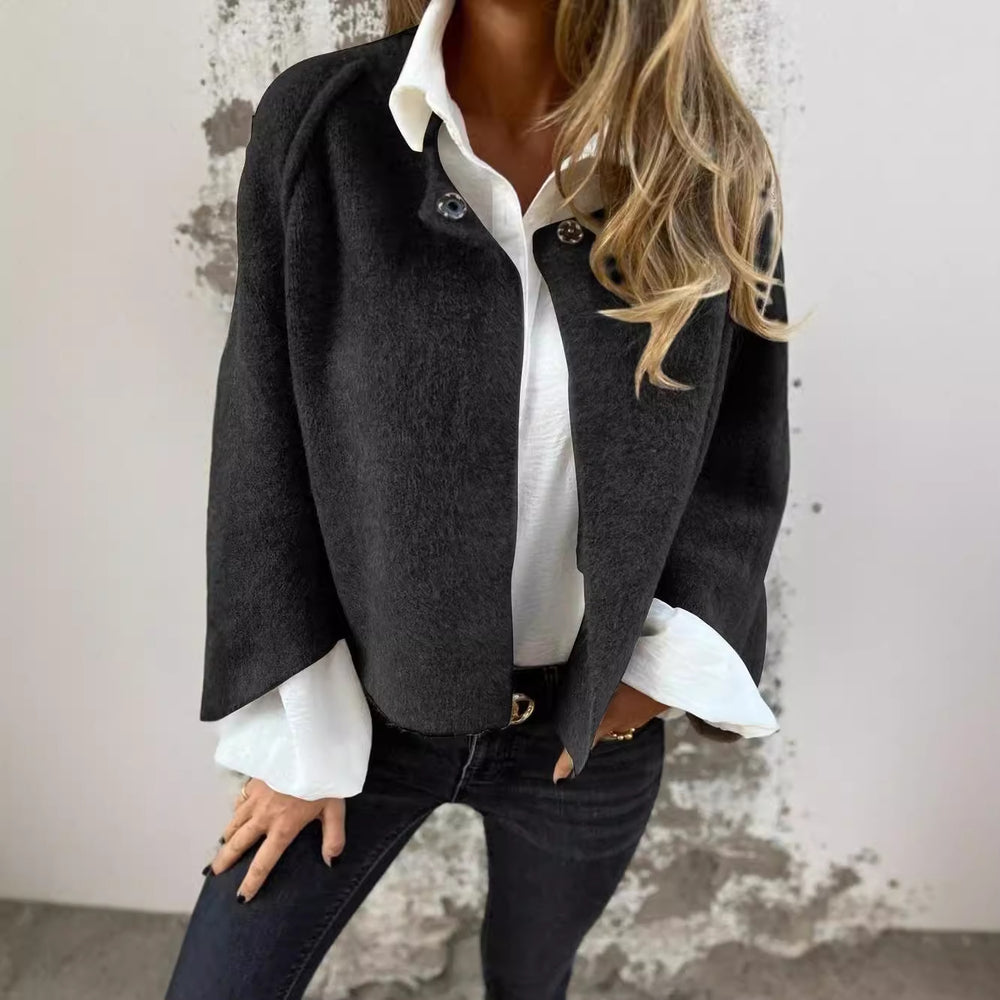 Black Judith fashionable warm jacket by Lurolondon, shown with front view and stylish design details.