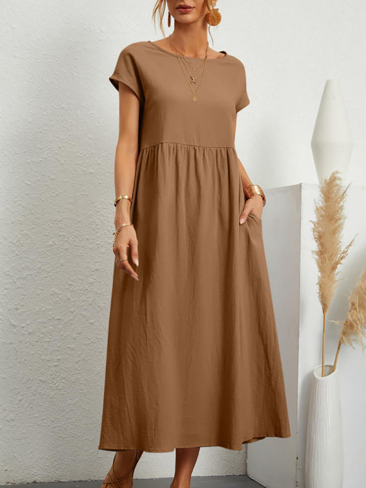 Veda Bremen Gabrielle midikleid in khaki with flowing, relaxed fit, lightweight fabric, and elegant, casual style.
