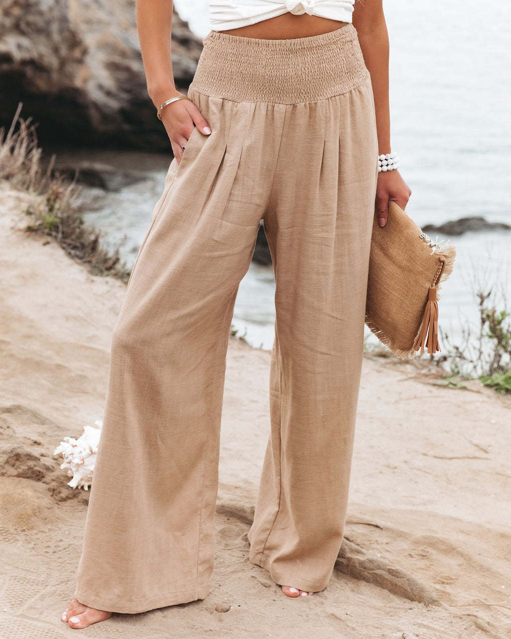 Veda Bremen Romy high-waisted khaki trousers with wide legs, made from comfortable, stylish fabric.