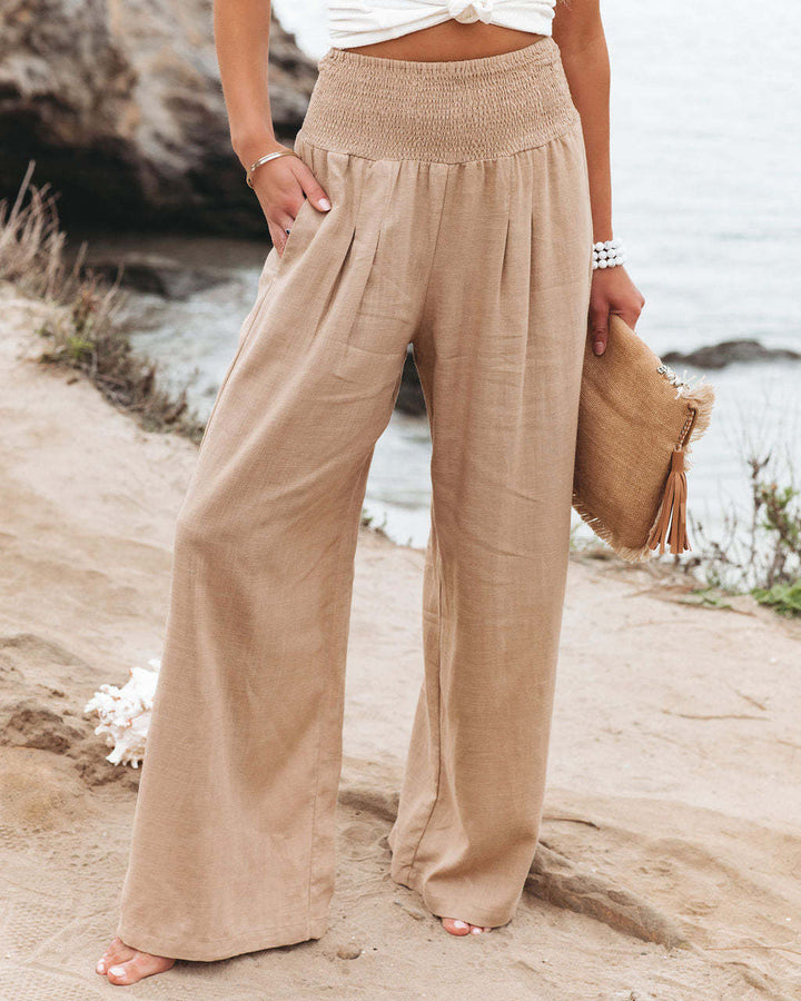 Veda Bremen Romy high-waisted khaki trousers with wide legs, made from comfortable, stylish fabric.