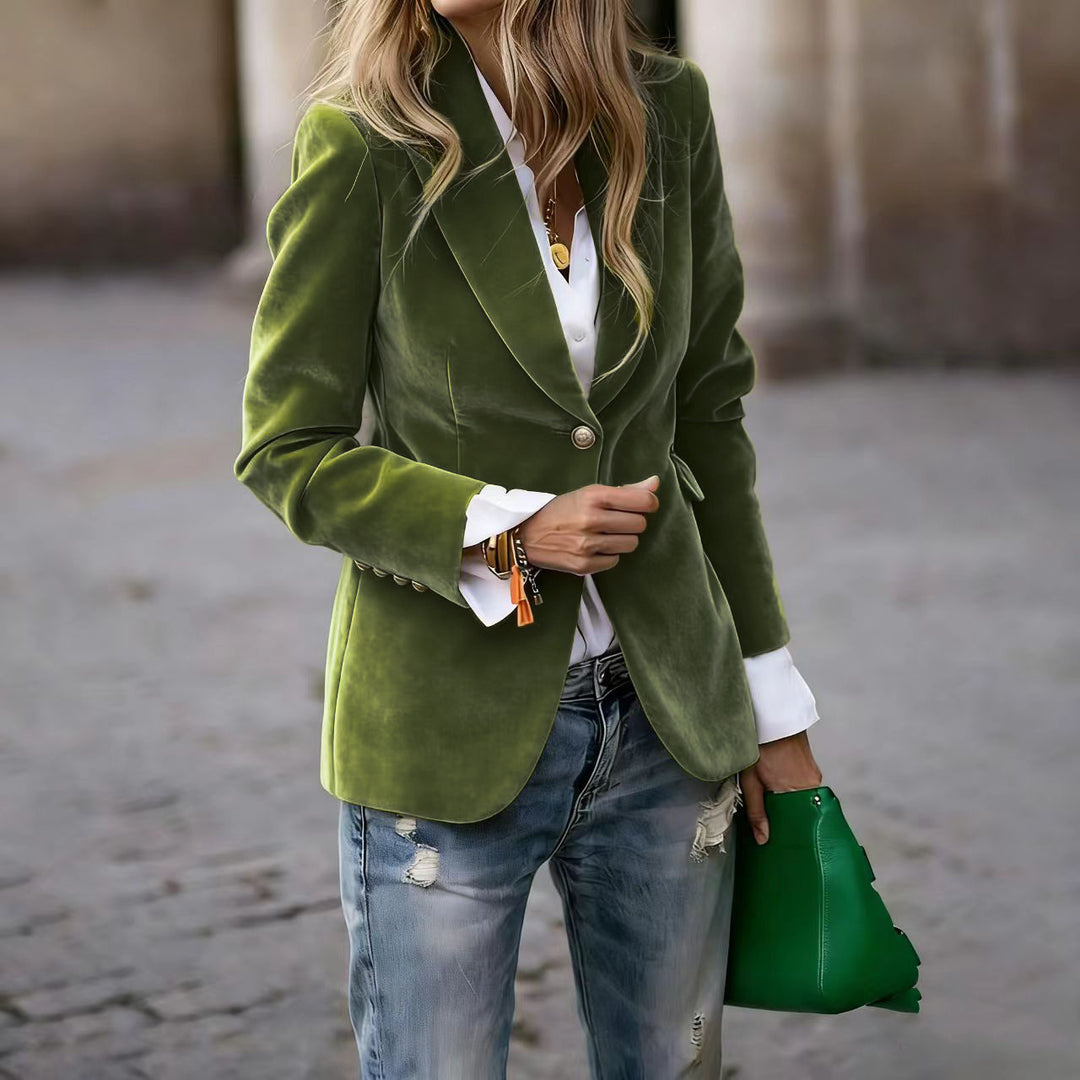 Light green Veda Bremen Alisha tailored blazer with a fitted silhouette and classic lapel, shown on a hanger.