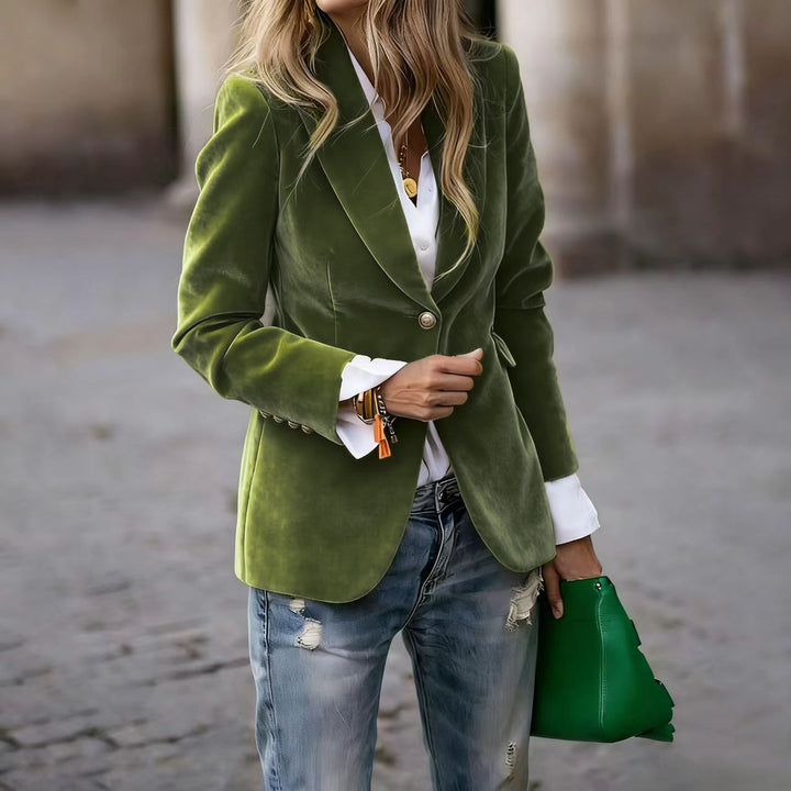 Light green Veda Bremen Alisha tailored blazer with a fitted silhouette and classic lapel, shown on a hanger.