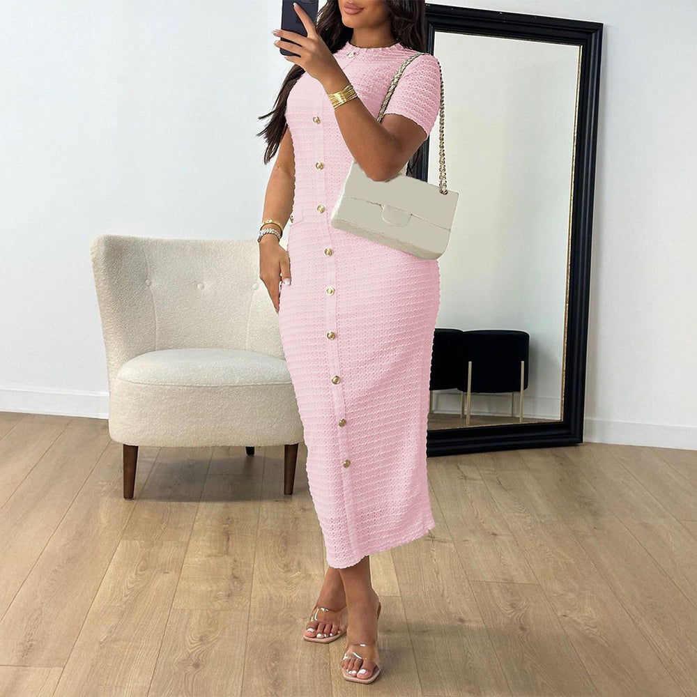 Light pink Rochelle Elegant Round Neck Dress by Lurolondon displayed on a hanger, showcasing its soft fabric and classic neckline.
