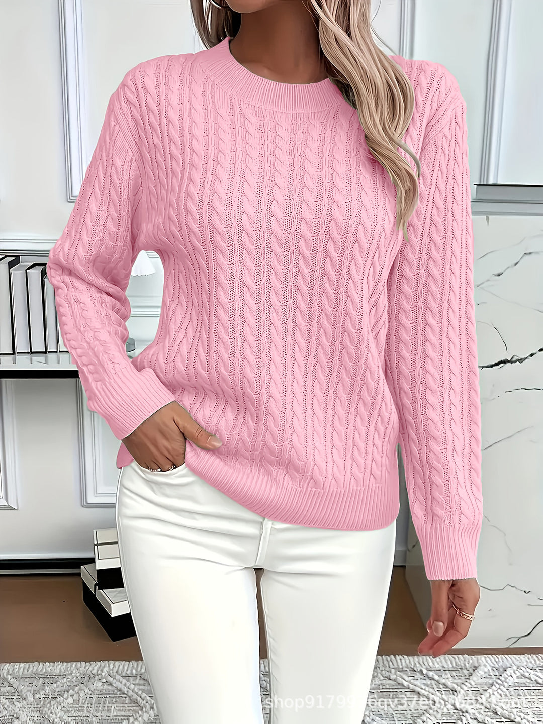 Light pink Rosa knitted sweater from Lurolondon.co.uk featuring a cozy, textured knit and a relaxed fit.