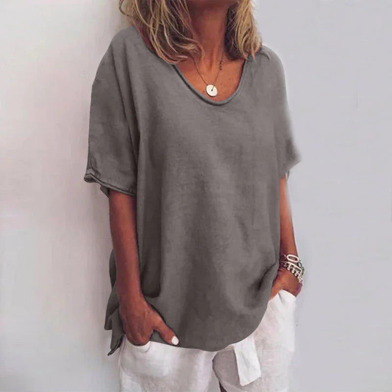Veda Bremen Vivian versatile linen blouse in neutral color, featuring a relaxed fit and classic collar for casual and elegant looks.