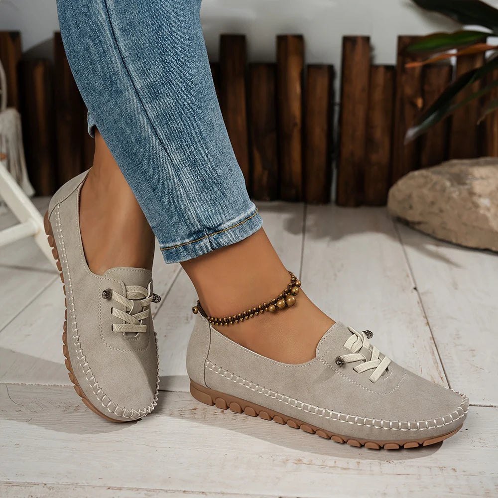 Off-white Valerie slipper by Veda Bremen designed for sensitive feet with full arch support and cushioned comfort.