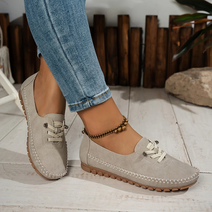 Off-white Valerie slipper by Veda Bremen designed for sensitive feet with full arch support and cushioned comfort.