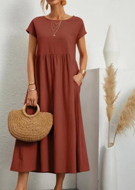 Orange Gabrielle Midikleid by Veda Bremen featuring a flowing, relaxed fit with elegant, lightweight fabric.