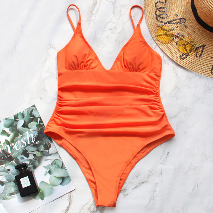 Orange Serena Veda Bremen one-piece swimsuit with a sleek design, featuring a smooth fabric and stylish cut.