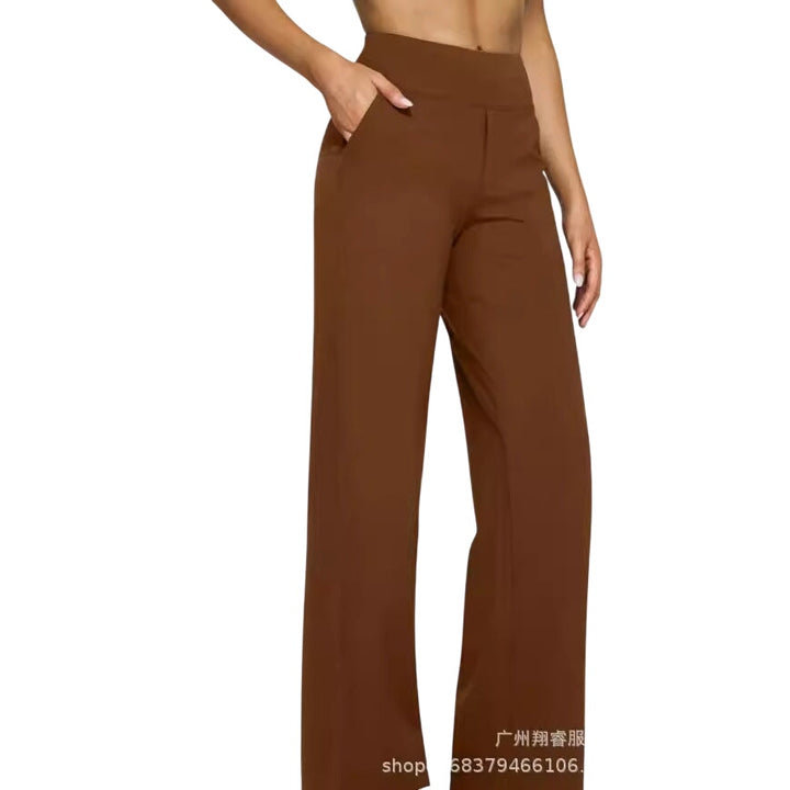 Veda Bremen Kara Stretch-Hose in black, close-up of fitted stretch fabric and waistband against neutral background.