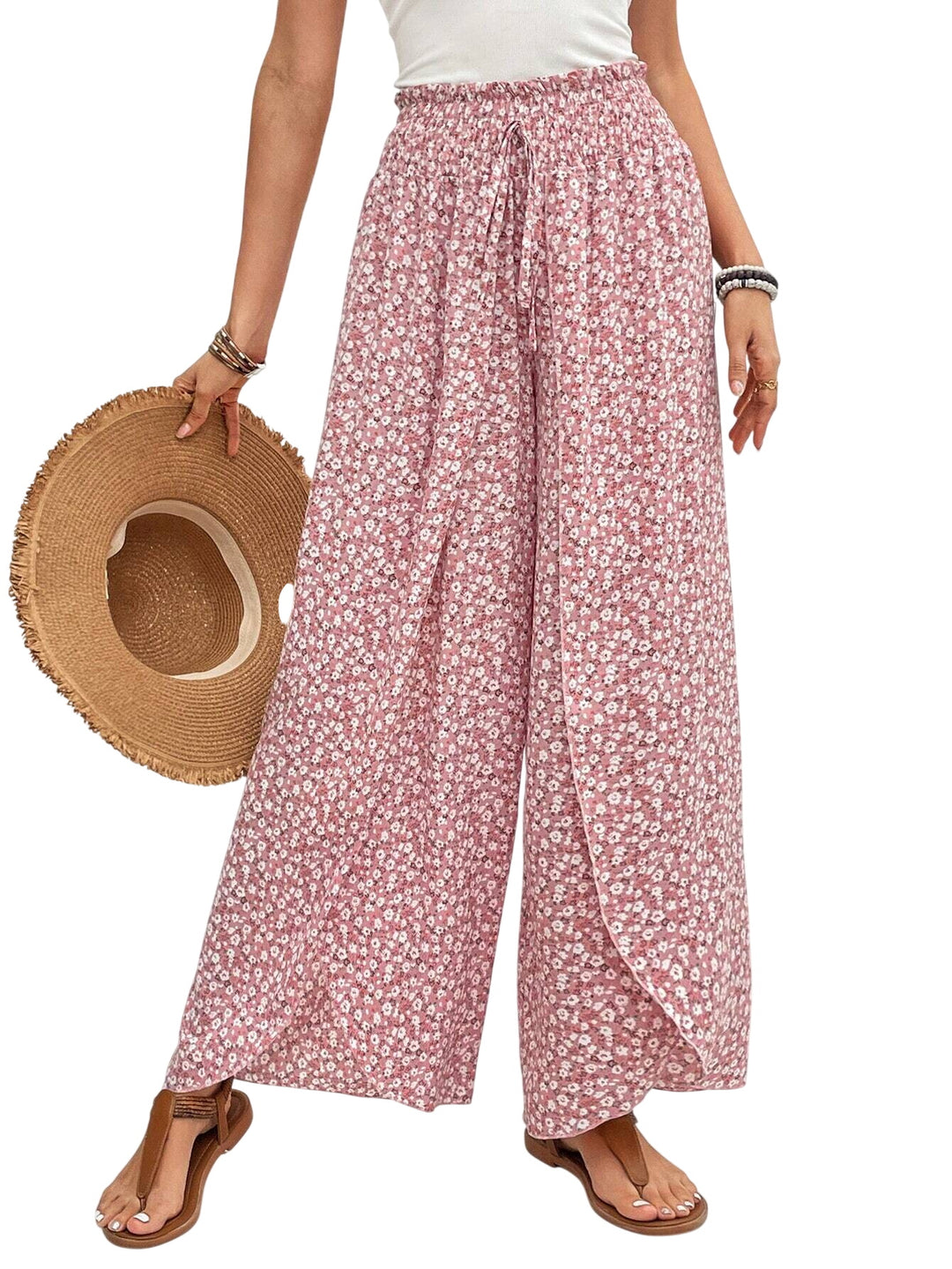 Veda Bremen Stella wide-leg printed trousers displayed on a model with a relaxed fit and bold print design.